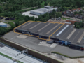 Het betreft de verhuur van een magazijn met kantoorruimte gelegen naast de E17 te Zwijndrecht. Deze site geniet een uitstekende nabij de Haven van Antwerpen en is ideaal gelegen tussen Antwerpen en Gent. Door haar ligging in KMO-gebied, biedt deze verschi